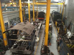 A variety of trains disassembled to be restored