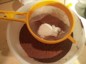 The salt and baking soda being sieved