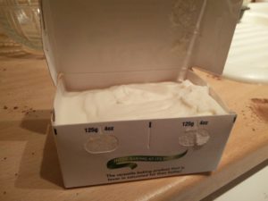 The vegetable shortening packaging has been opened, showing the contents