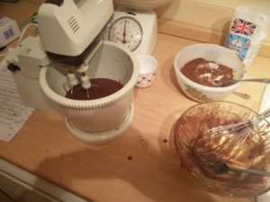 The electric mixer now containing the cake mix