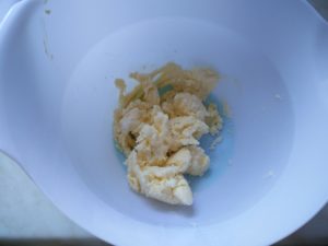 The bowl with the sugar and butter mixed together