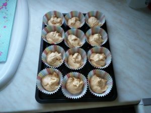 The cake mix in the cake cases