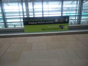 Signage showing directions for transfer flights