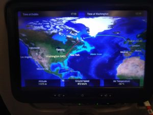 The flight map showing the plane over the edge of Canada, and some statistics about the journey at that point in time