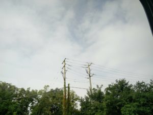A patch of blue sky showing through clouds