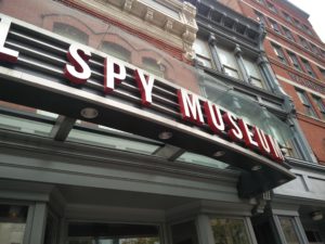 Part of the entrance to the International Spy Museum, showing the words "Spy Museum"