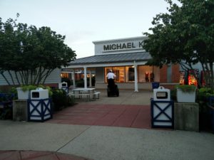 The security officer leaving on a Segway