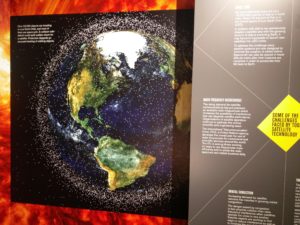 An image of planet Earth showing the amount of space junk around it