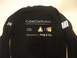 The back of my hoodie, showing CyberCenturion, Tux, the Windows logo, my initials and 4 stripes (the number of times I'd been to a final)
