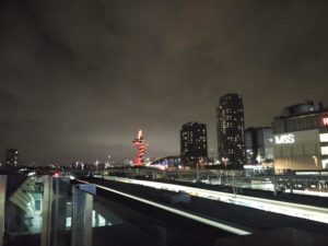 The Orbit sculpture against light coloured clouds