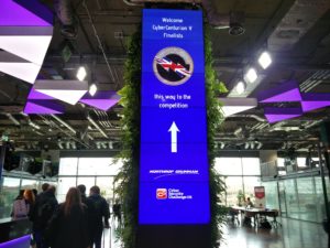 A tall display screen showing a welcome message to the CyberCenturions