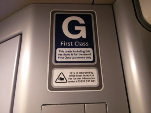 A sign showing a warning to non-first class passengers